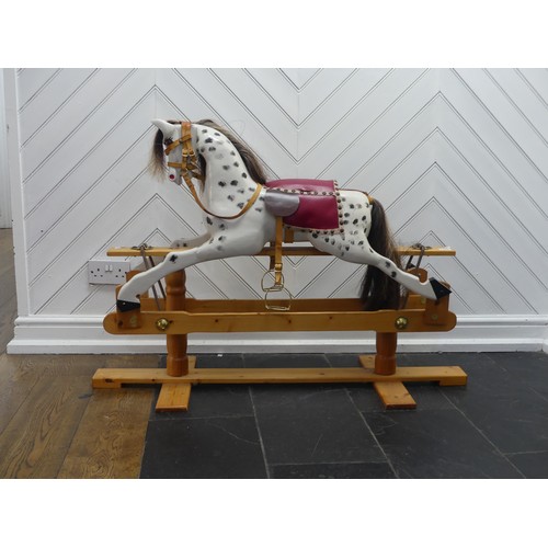 518 - A 20th century carved and painted Rocking Horse, with horse hair mane and tail, W 121 cm x H 84 cm x... 