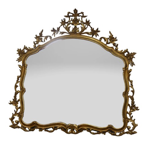 541 - A 19th century style giltwood framed wall Mirror, of large proportions, with a carved and pierced fo... 