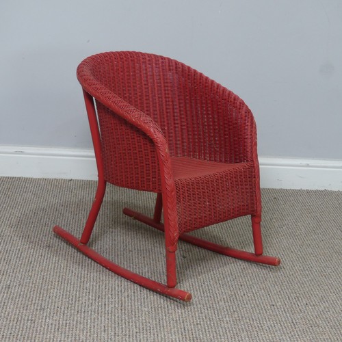 545 - A 1930's Lloyd Loom 'Lusty' child's rocking Chair, with label to underside, W 41 cm x H 54 cm x D 55... 