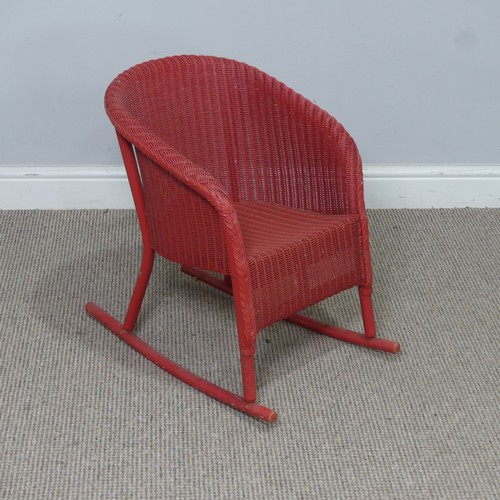 545 - A 1930's Lloyd Loom 'Lusty' child's rocking Chair, with label to underside, W 41 cm x H 54 cm x D 55... 