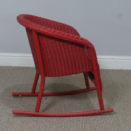 545 - A 1930's Lloyd Loom 'Lusty' child's rocking Chair, with label to underside, W 41 cm x H 54 cm x D 55... 