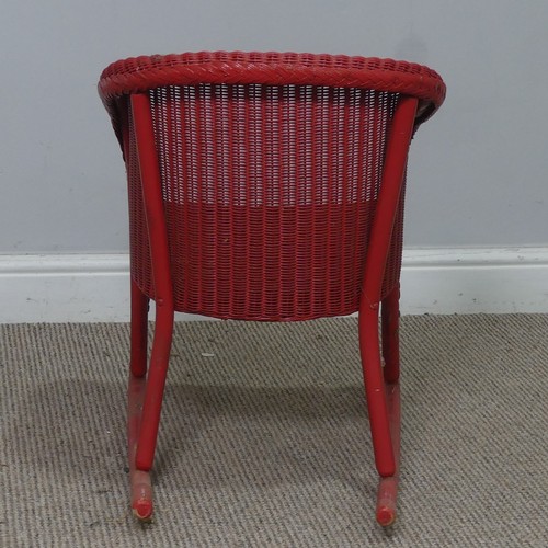 545 - A 1930's Lloyd Loom 'Lusty' child's rocking Chair, with label to underside, W 41 cm x H 54 cm x D 55... 