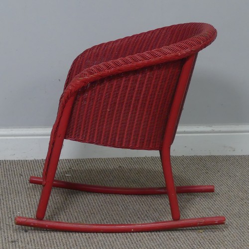 545 - A 1930's Lloyd Loom 'Lusty' child's rocking Chair, with label to underside, W 41 cm x H 54 cm x D 55... 