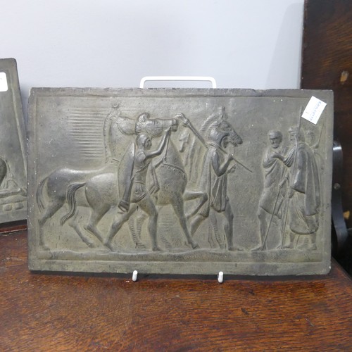 657 - Three early 20thC black/bronzed ceramic Plaques, depicting classical Greek scenes in low relief, pro... 