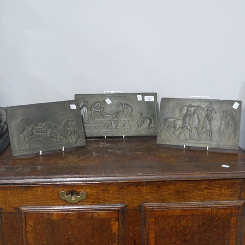 657 - Three early 20thC black/bronzed ceramic Plaques, depicting classical Greek scenes in low relief, pro... 