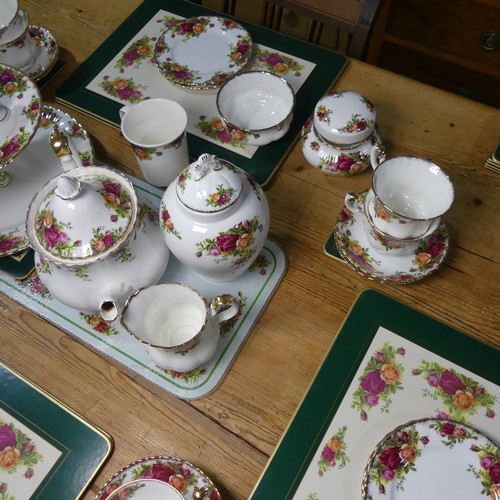 716 - A Royal Albert 'Country Roses' pattern six piece Tea Service, together with accessories including ca... 