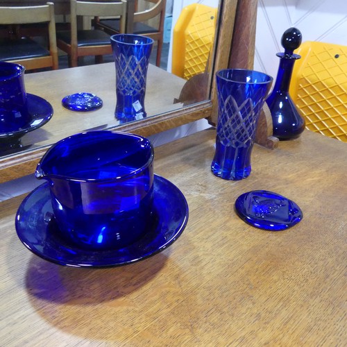 717 - A collection of Thomas Webb 'Bristol Blue' glass, including a pair of ship's decanters, one marked '... 