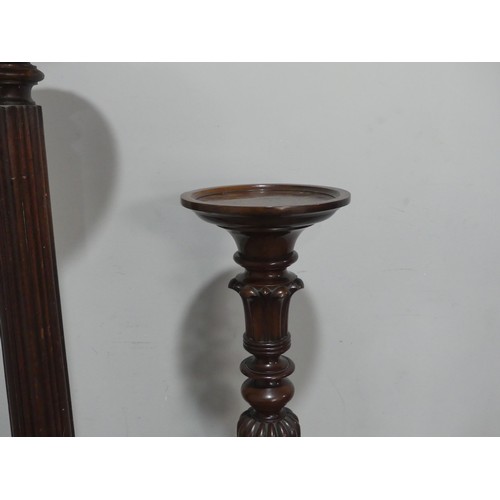 731 - A Victorian mahogany Plant Stand, raised on a reeded column, H 134 cm, together with a carved Victor... 