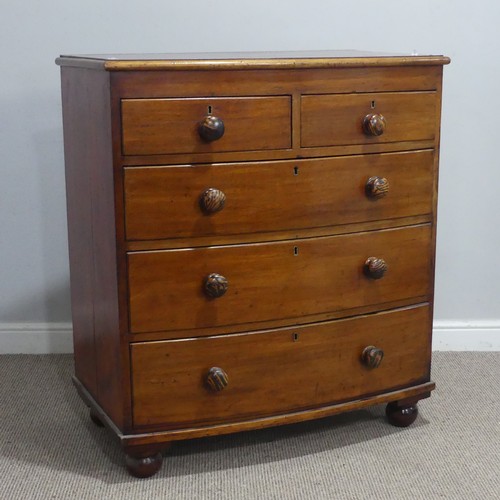 639 - A Victorian mahogany bowfront Chest of drawers, the drawer fronts with simulated tiger wood turned k... 