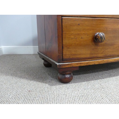 639 - A Victorian mahogany bowfront Chest of drawers, the drawer fronts with simulated tiger wood turned k... 