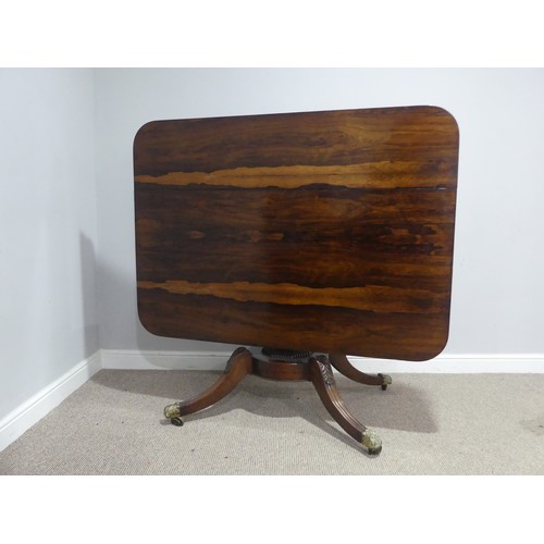 729 - A Regency rosewood tilt-top pedestal Table, the large rectangular top with moulded edges and beaded ... 