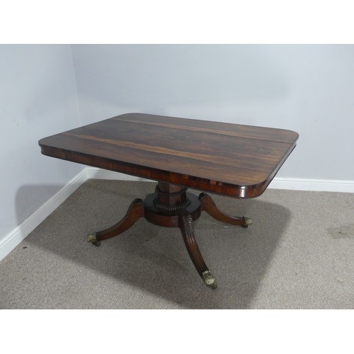 729 - A Regency rosewood tilt-top pedestal Table, the large rectangular top with moulded edges and beaded ... 