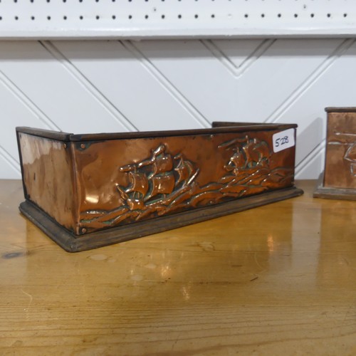 528 - An Arts & Crafts oak and copper book Trough, the copper embossed with ships in the style of Newl... 