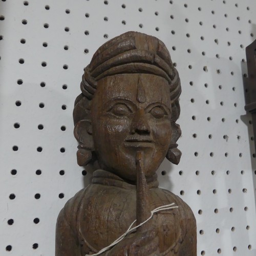 665 - A 19th century Indian Gujarat figural carving of Pipe-Smoker, H 66 cm.