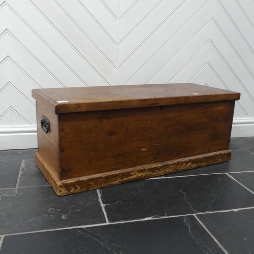 601 - An antique stained pine blanket Box, of small proportions, with metal carrying handles to either sid... 