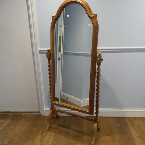 664 - A contemporary pine cheval Mirror, with twisted supports, W 66 cm x H 153.5 cm x D 34 cm, together w... 