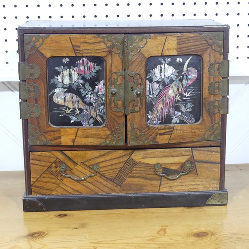 673 - An early 20th century Japanese marquetry table top Cabinet, decorated with mother of pearl highlight... 