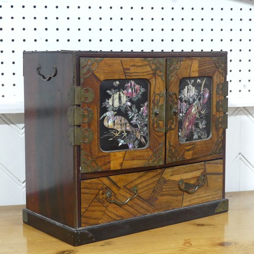 673 - An early 20th century Japanese marquetry table top Cabinet, decorated with mother of pearl highlight... 