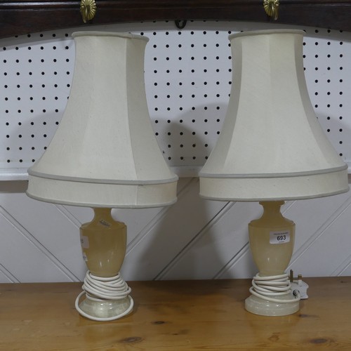 693 - A pair of 20th century alabaster table Lamps, with shades, both with labels to undersides ''Jonathan... 