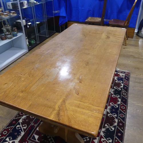 692 - An early 20th century light oak refectory dining Table, of peg construction, W 168 cm x H 73 cm x D ... 