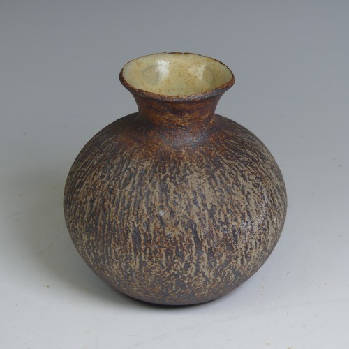 95 - Waistel Cooper (1921-2003); a squat stoneware vase with textured iron surface and glazed interior, p... 