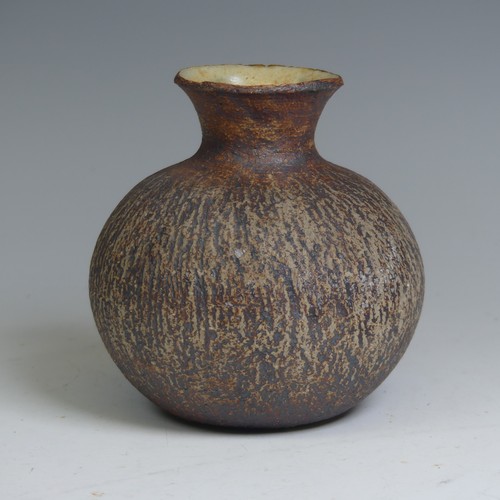 95 - Waistel Cooper (1921-2003); a squat stoneware vase with textured iron surface and glazed interior, p... 