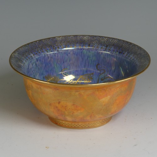 100 - Daisy Makeig-Jones for Wedgwood; a Dragon lustre Bowl, with mottled orange ground and overpainted gi... 