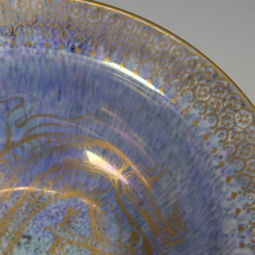 100 - Daisy Makeig-Jones for Wedgwood; a Dragon lustre Bowl, with mottled orange ground and overpainted gi... 