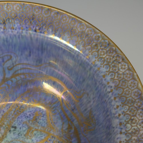 100 - Daisy Makeig-Jones for Wedgwood; a Dragon lustre Bowl, with mottled orange ground and overpainted gi... 