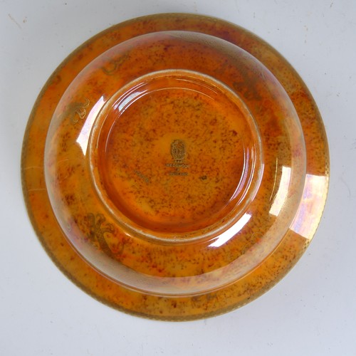 100 - Daisy Makeig-Jones for Wedgwood; a Dragon lustre Bowl, with mottled orange ground and overpainted gi... 