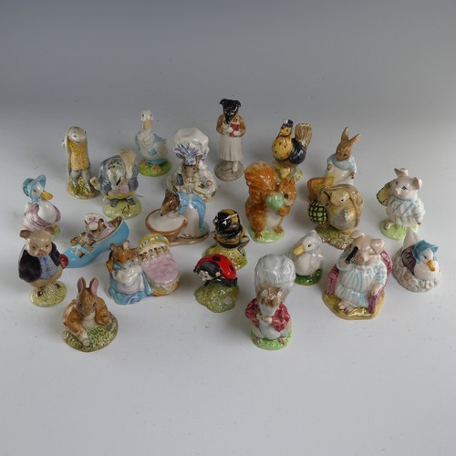 114 - A quantity of Beatrix Potter Figures, primarily Beswick with some Royal Albert examples, to comprise... 