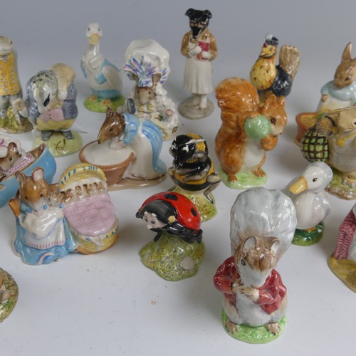 114 - A quantity of Beatrix Potter Figures, primarily Beswick with some Royal Albert examples, to comprise... 