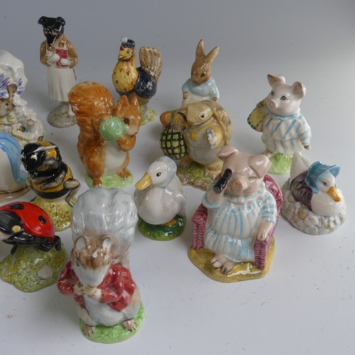 114 - A quantity of Beatrix Potter Figures, primarily Beswick with some Royal Albert examples, to comprise... 