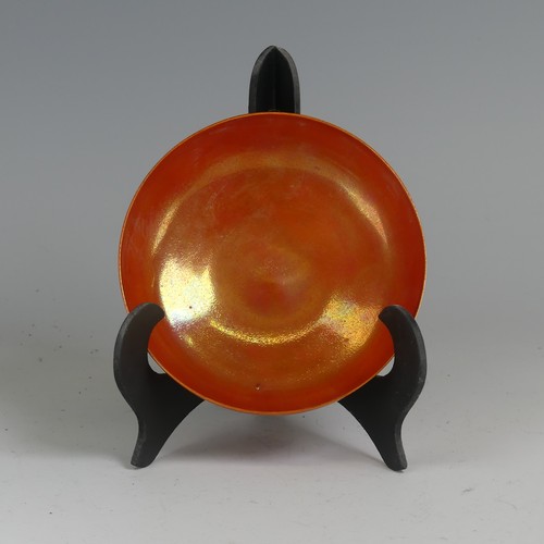 117 - A Ruskin pottery high-fired eggshell footed Bowl, in an orange lustre glaze, probably designed by Wi... 