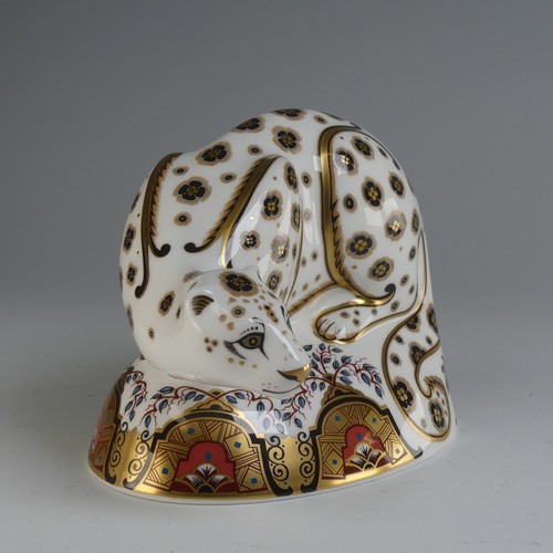 122 - A Royal Crown Derby 'Snow Leopard' Paperweight, with gold stopper and box.