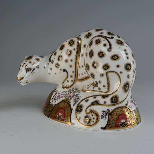 122 - A Royal Crown Derby 'Snow Leopard' Paperweight, with gold stopper and box.