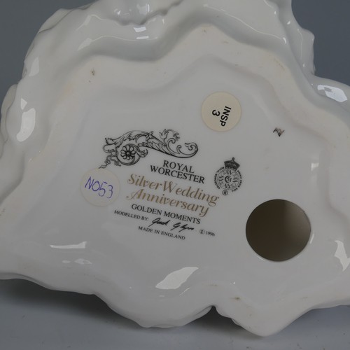 124 - A limited edition Royal Worcester 'Young Welshman', with box and certificate of authenticity, also R... 