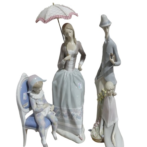 141 - A large Lladro figurine of lady with parasol, H 48cm, together with another large Lladro figurine of... 