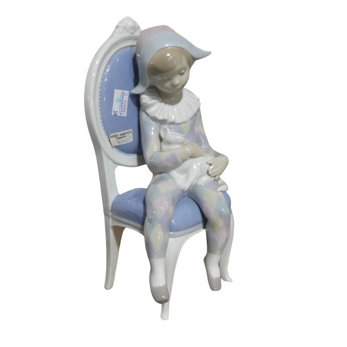 141 - A large Lladro figurine of lady with parasol, H 48cm, together with another large Lladro figurine of... 