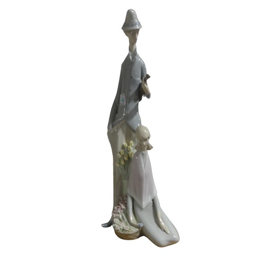 141 - A large Lladro figurine of lady with parasol, H 48cm, together with another large Lladro figurine of... 