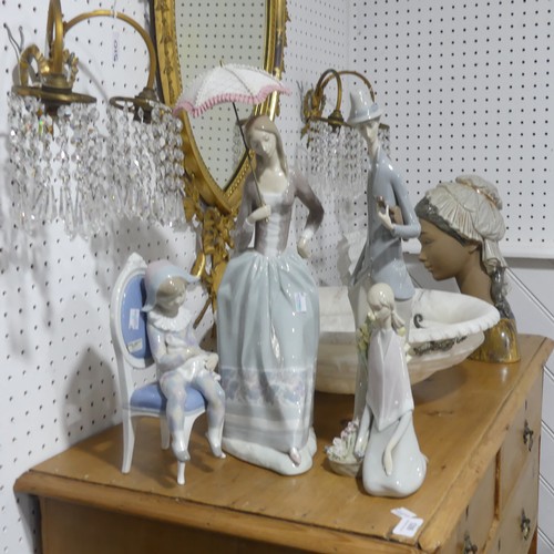 141 - A large Lladro figurine of lady with parasol, H 48cm, together with another large Lladro figurine of... 