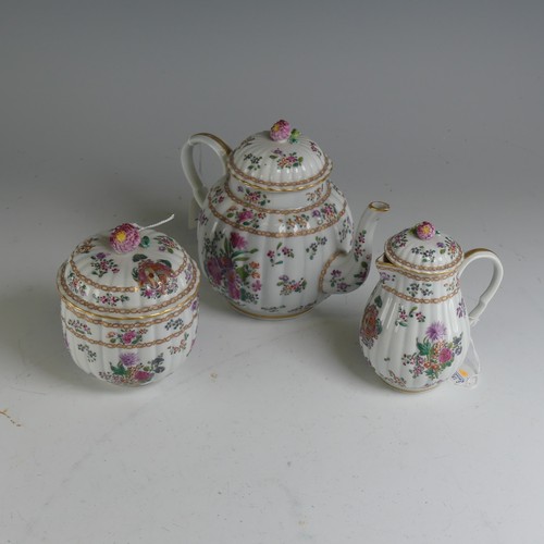 150 - A French Armorial three piece Tea Set, in the Chinese famille rose style, of lobed form, including T... 