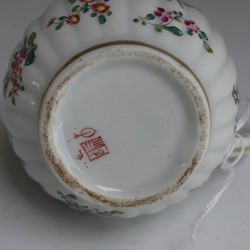 150 - A French Armorial three piece Tea Set, in the Chinese famille rose style, of lobed form, including T... 