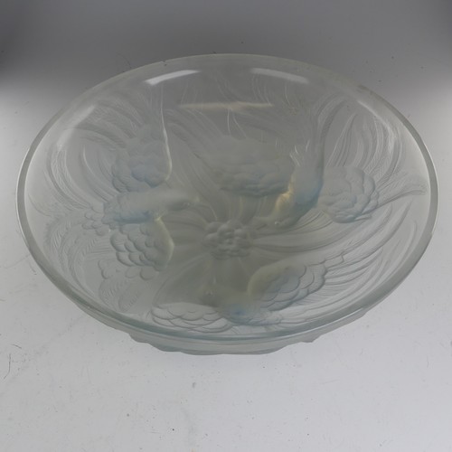 109 - A Jobling Lambton bird pattern opalescent glass Bowl, raised on three relief depictions of flying bi... 