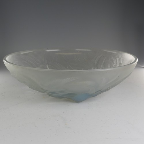 109 - A Jobling Lambton bird pattern opalescent glass Bowl, raised on three relief depictions of flying bi... 