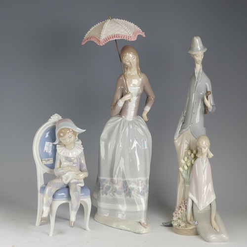 141 - A large Lladro figurine of lady with parasol, H 48cm, together with another large Lladro figurine of... 