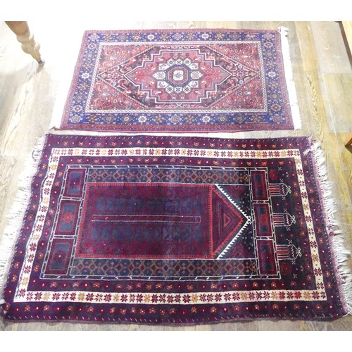 709 - Tribal Rugs: a red ground Belouchi Prayer Rug, 100% wool, 150cm x 86cm, together with a Persian Zanj... 