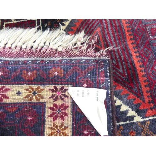 709 - Tribal Rugs: a red ground Belouchi Prayer Rug, 100% wool, 150cm x 86cm, together with a Persian Zanj... 