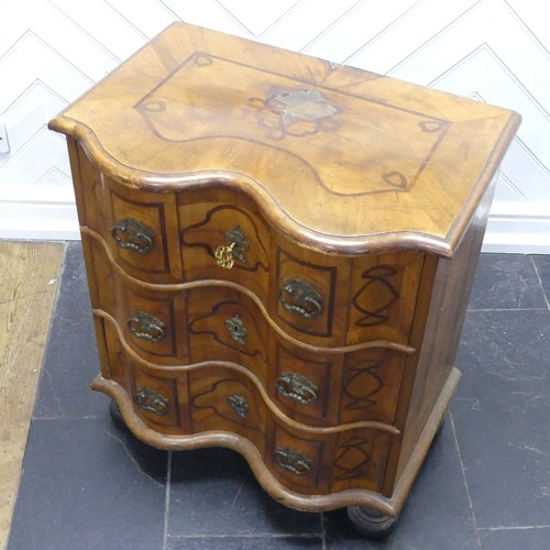 624 - A 19th century inlaid serpentine Chest of drawers, of small proportions, the moulded top over three ... 