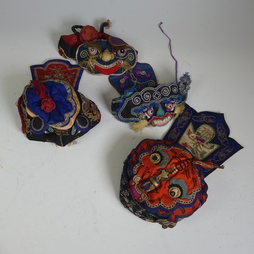 166 - Early 20th century, Qing Dynasty, Chinese silk embroidery: two children's Festival Hats, one emblema... 